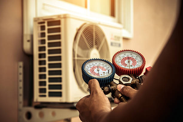 Professional Heat Pump Repair technician working in Monroe, NC